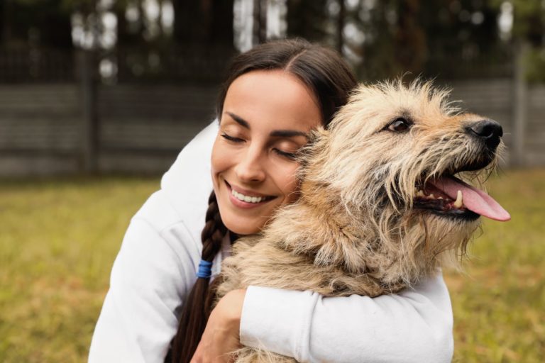 Girl Hugging Dog